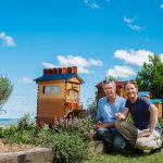 Flow Hive co-inventors father and son Stuart and Cedar Anderson with an updated version of their multiple award-winning Flow Hive the Flow Hive 2 small. honeyflow.com 2018